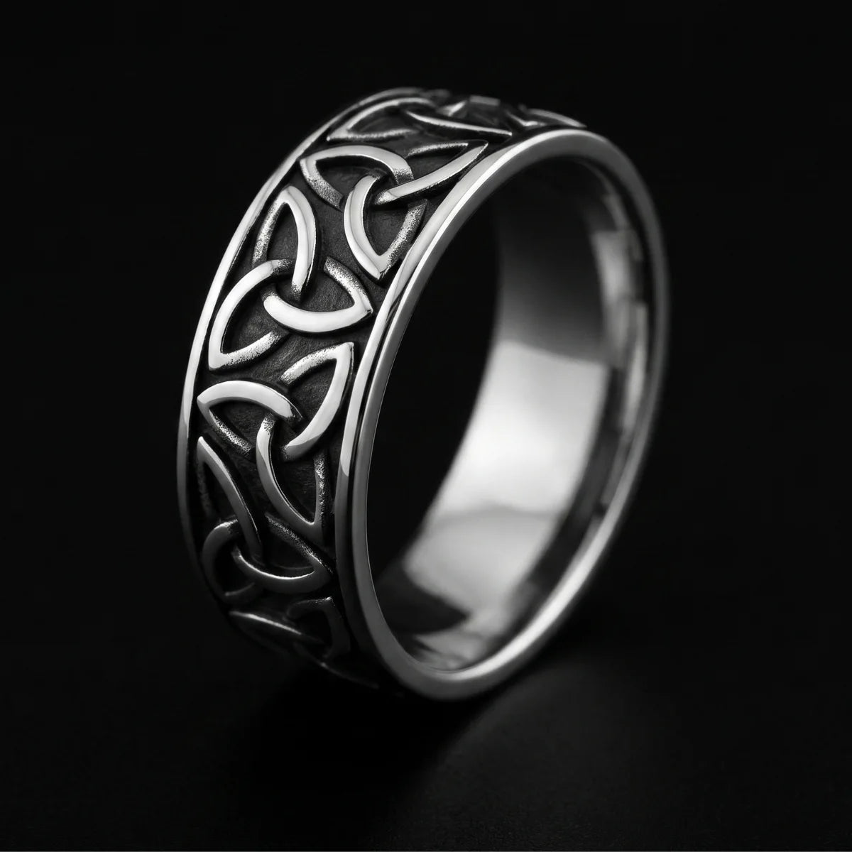 Celtic Knot Band Ring Silver Close Up Black Background