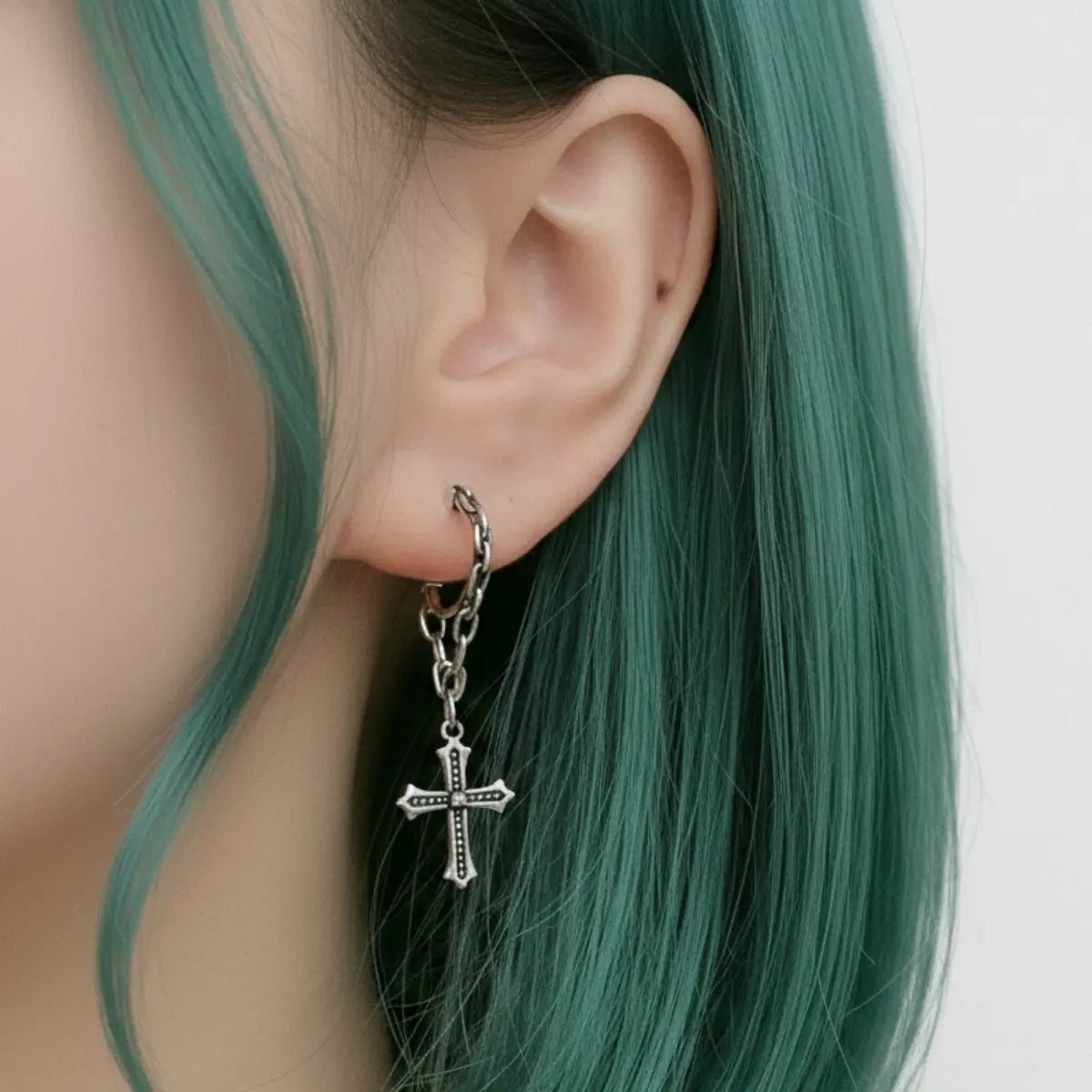 Chain Cross Dangle Earrings Worn by Female Model