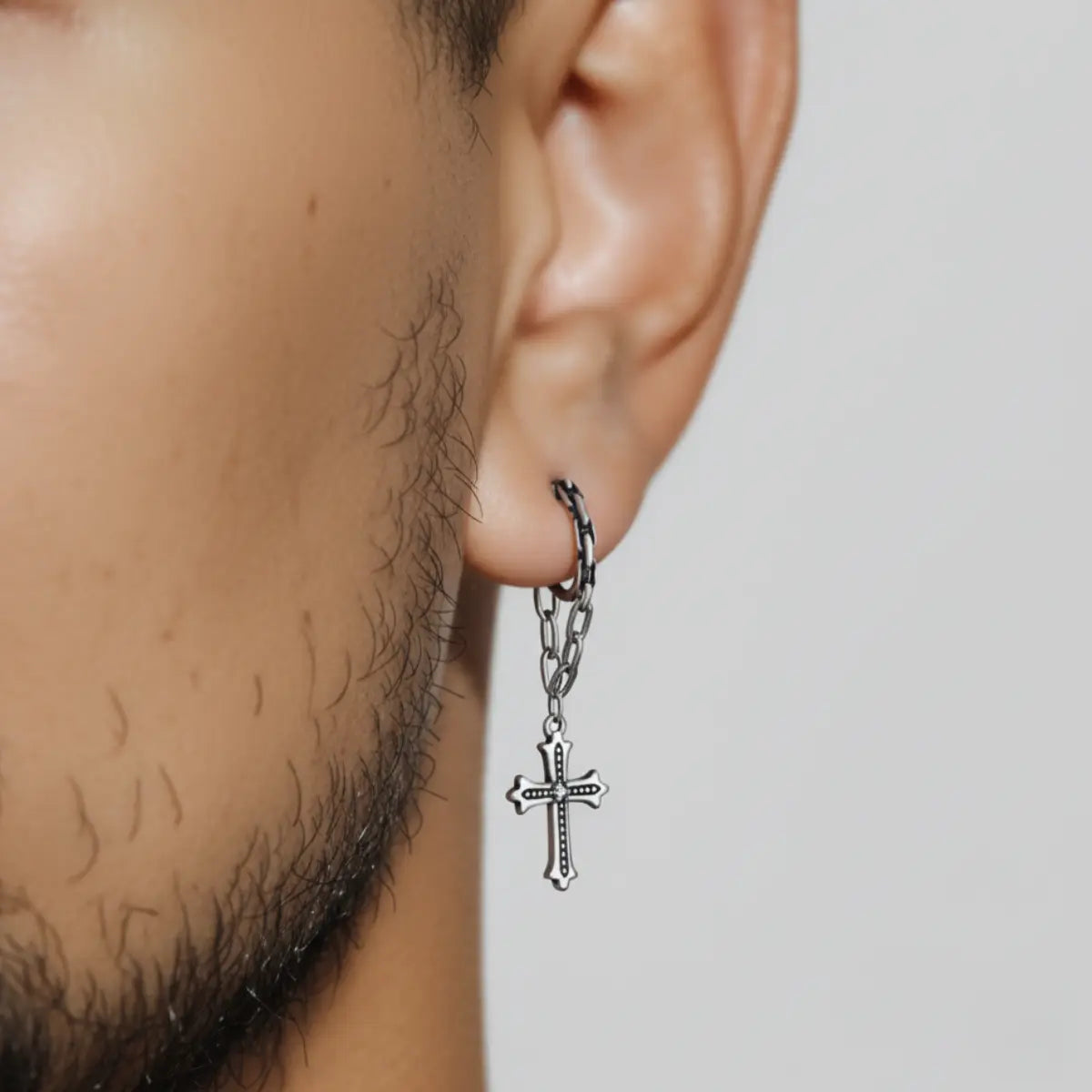 Chain Cross Dangle Earrings Worn by Male Model