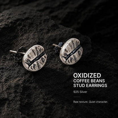 Coffee Bean Stud Earrings 925 Silver Pair Displayed on Stone Surface
