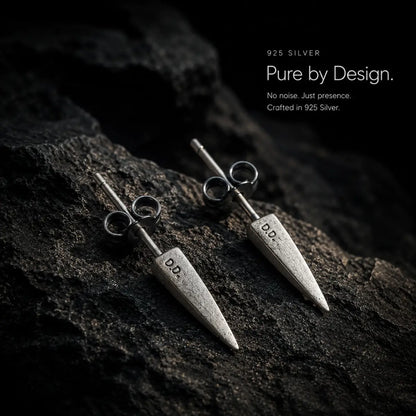 Cone Stud Earrings 925 Silver Pair Displayed on Stone Surface
