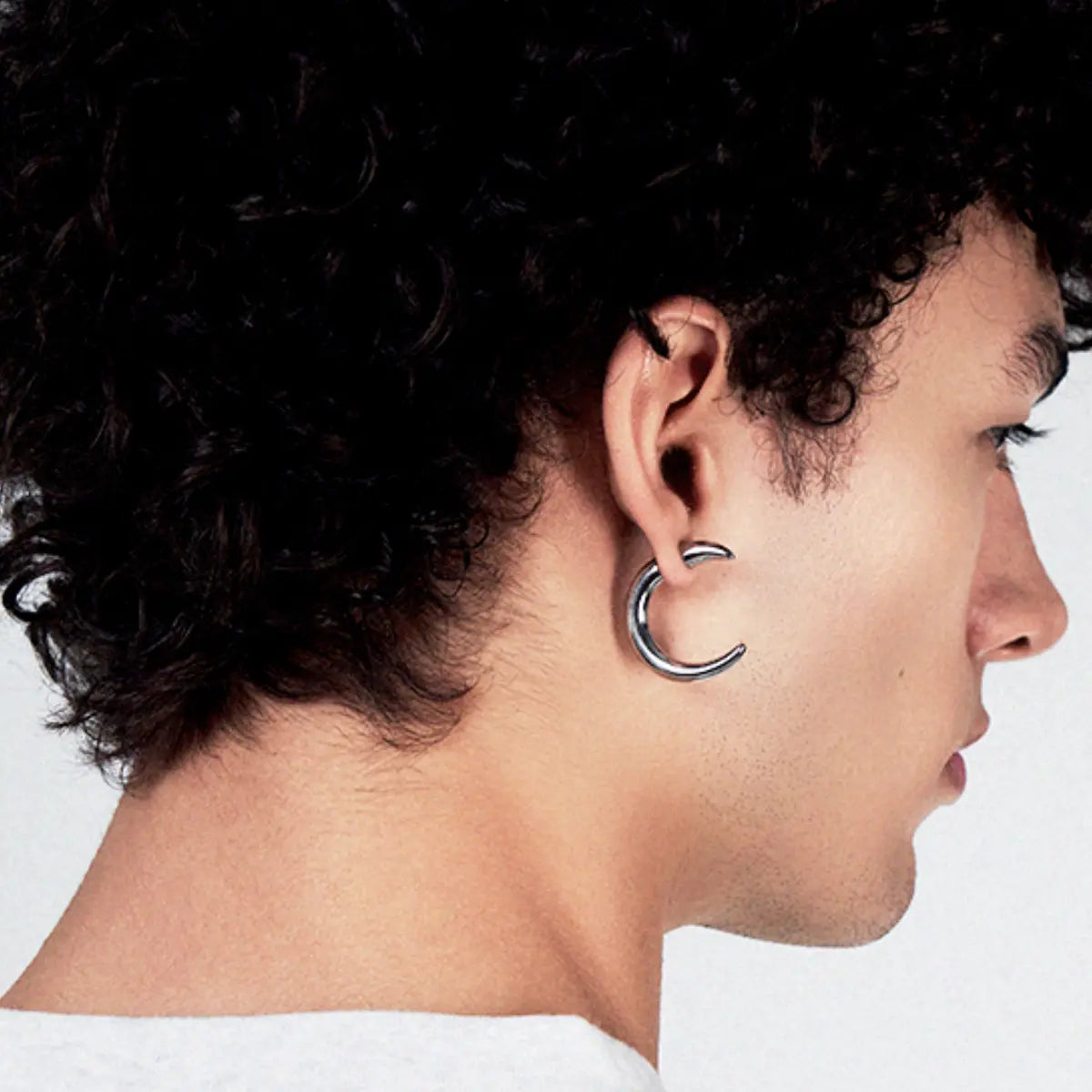 Crescent Moon Earrings Worn by Male Model Front View