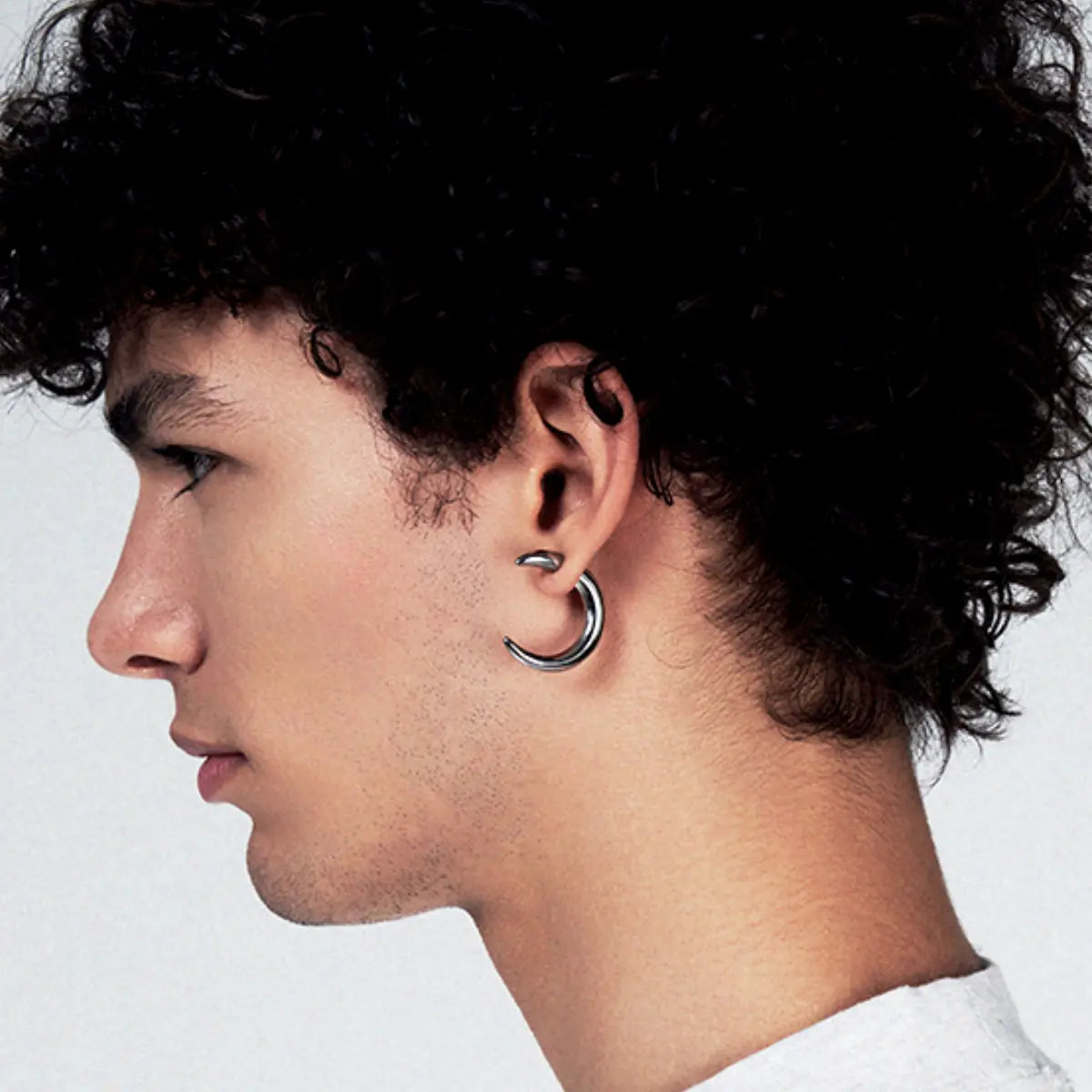 Crescent Moon Earrings Worn by Male Model Side View