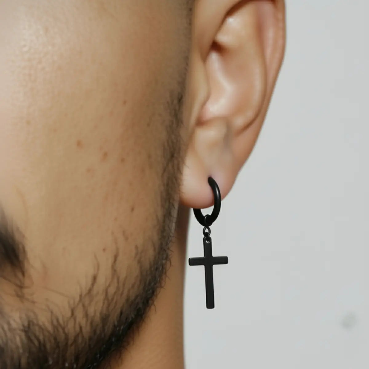 Cross Dangle Hoop Earrings Black Worn by Male Model