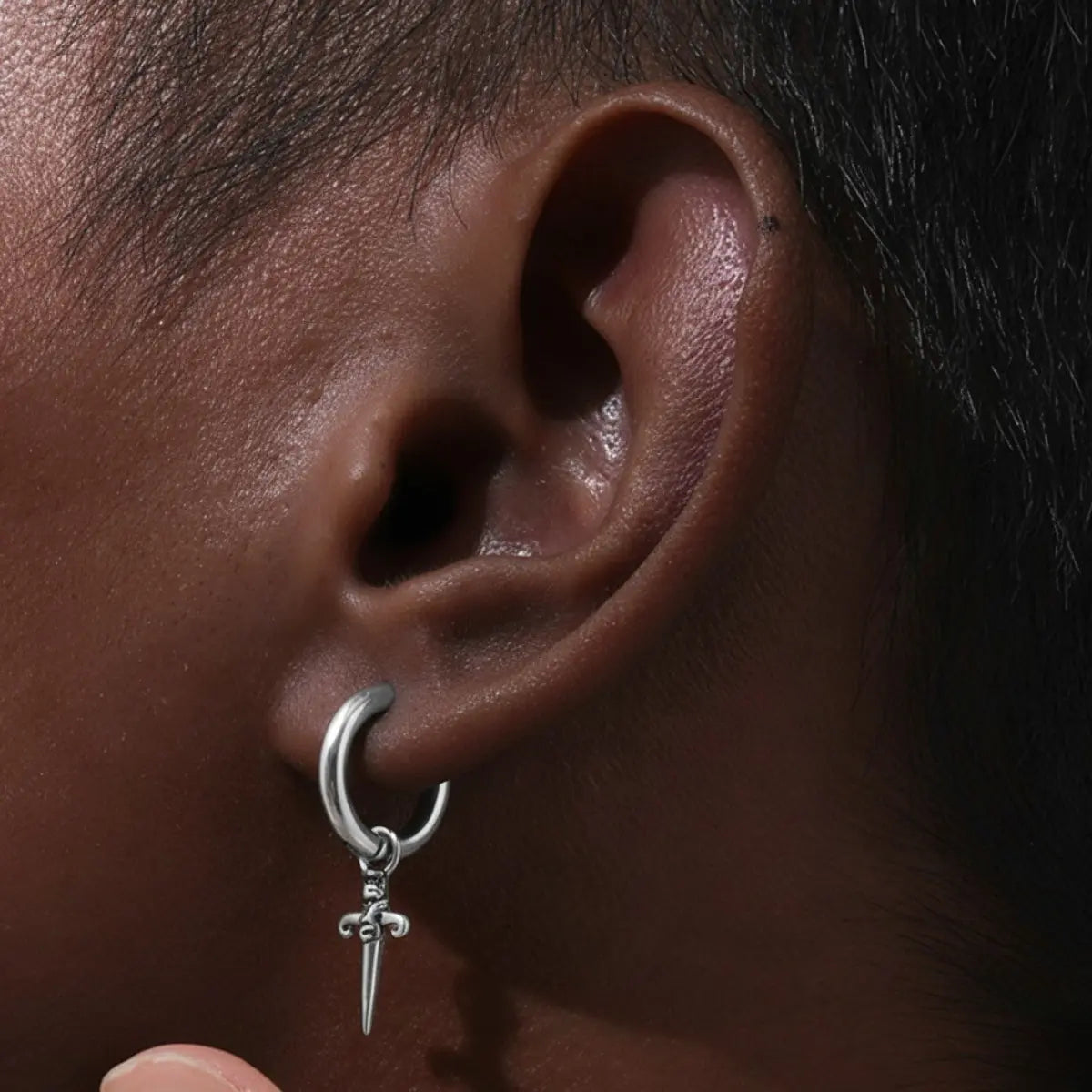 Dagger Drop Hoop Earrings Silver Worn by Male Model Close Up