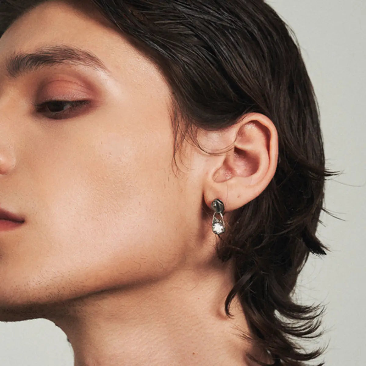 Diamond Zipper Stud Earrings Worn by Male Model Close up