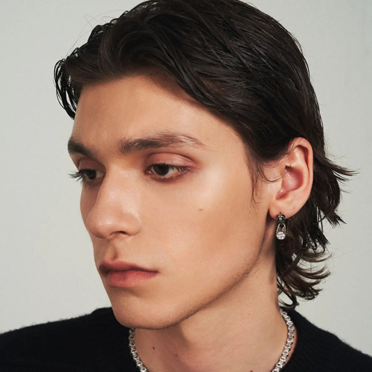 Diamond Zipper Stud Earrings Worn by Male Model Front View