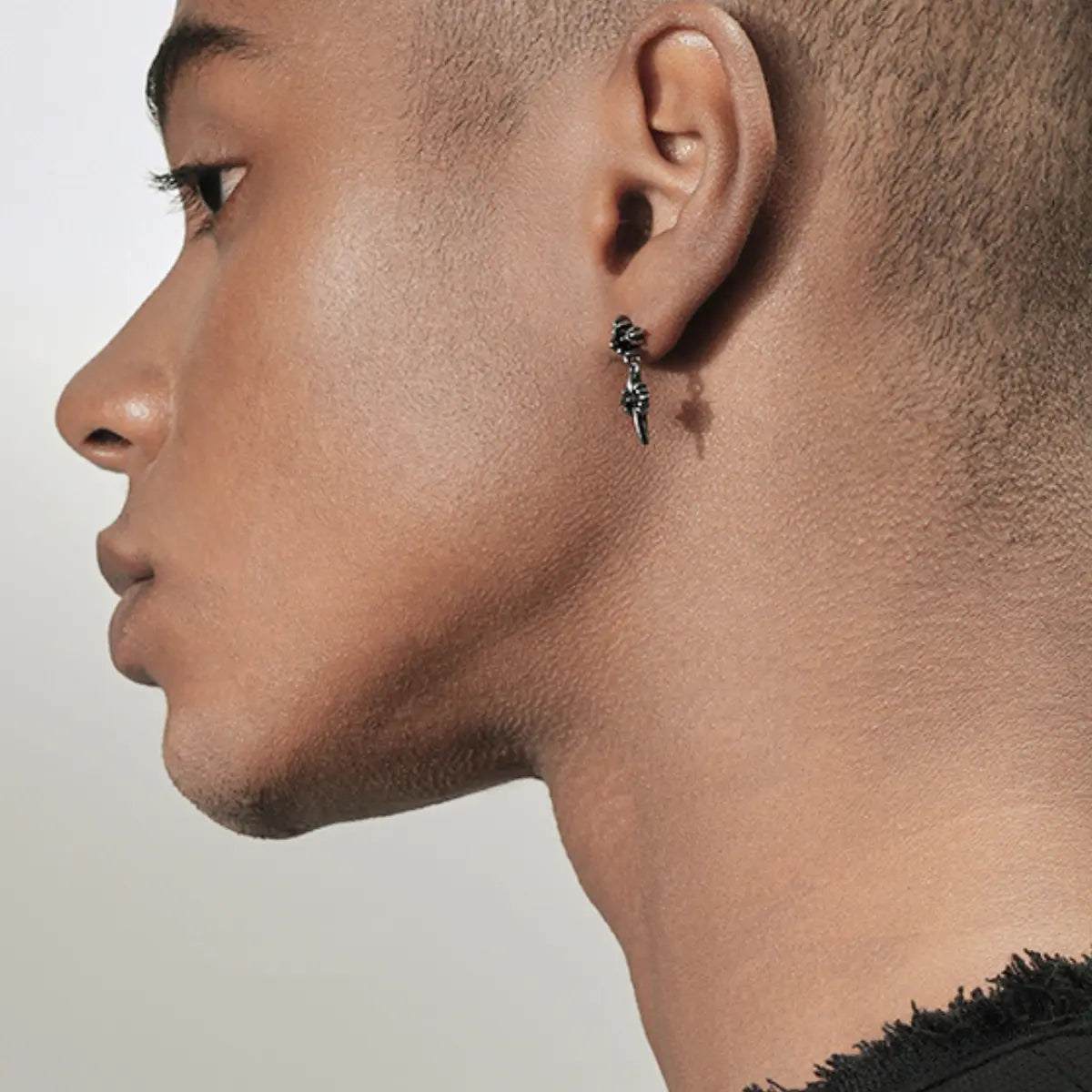 Double North Star Diamond Drop Stud Earrings Worn by Male Model Side