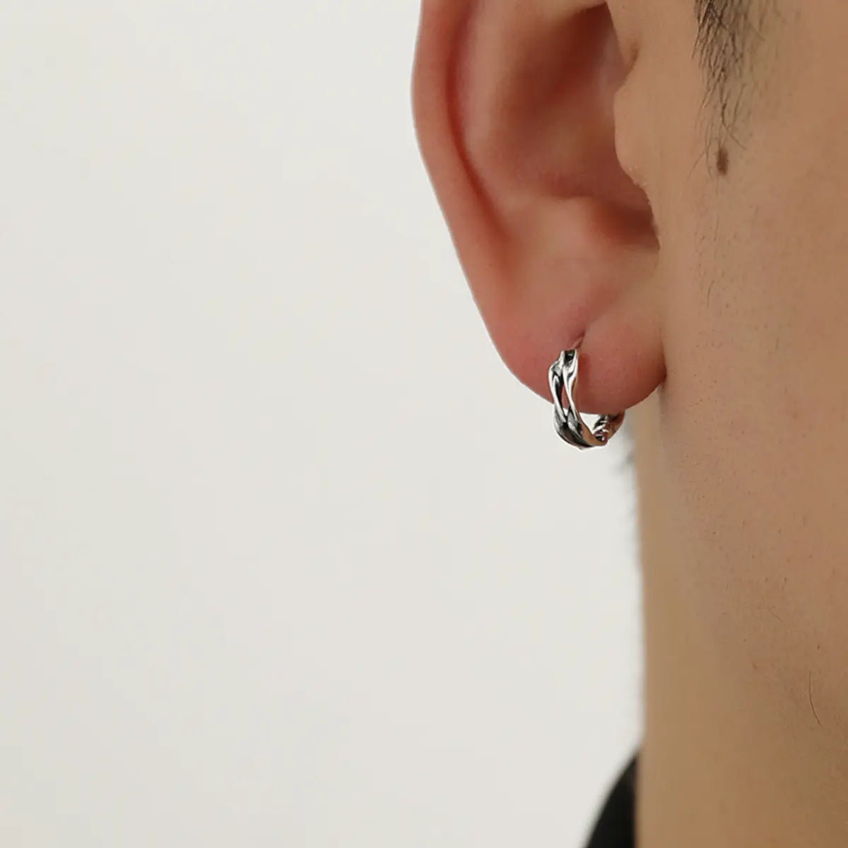 Double Twist Mobius Earrings Worn By Male Model