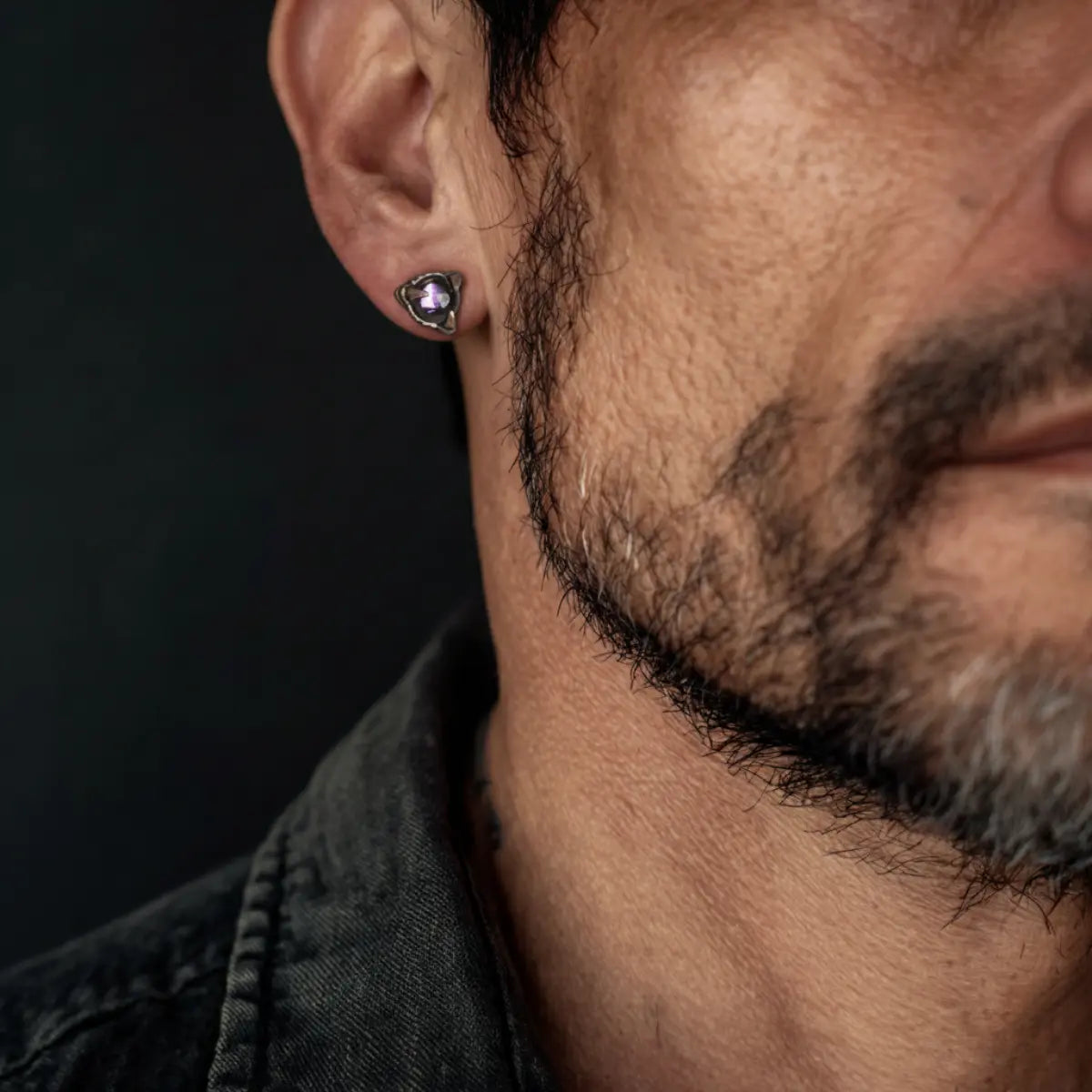 Dragon Claw Garnet Stud Earrings Worn by Male Model Close Up