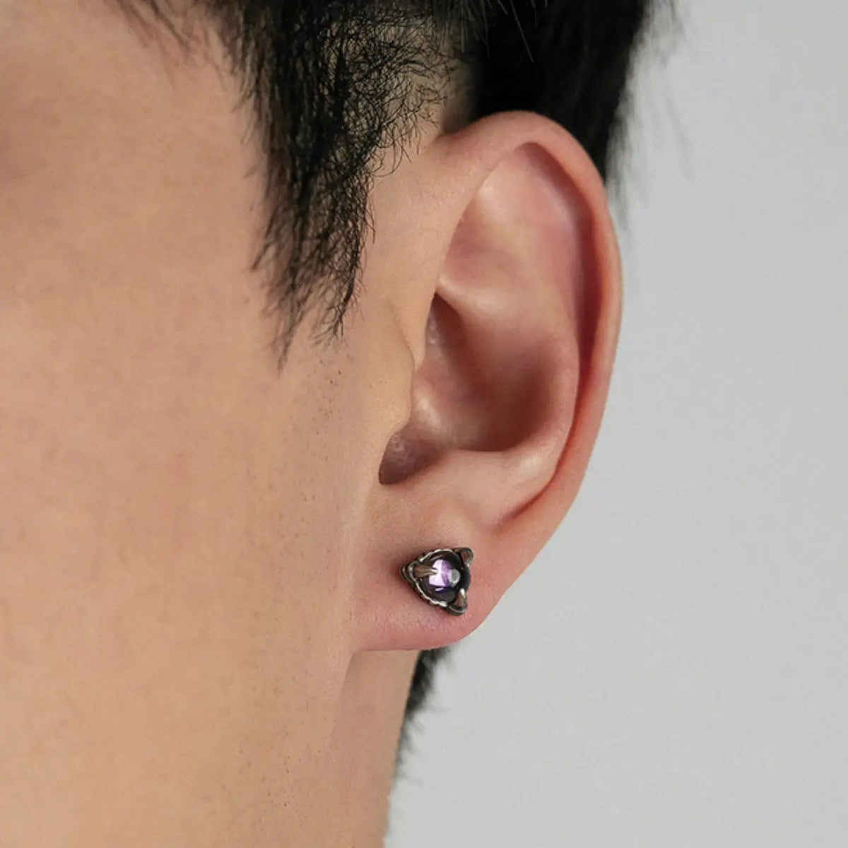 Dragon Claw Garnet Stud Earrings Worn by Male Model Side