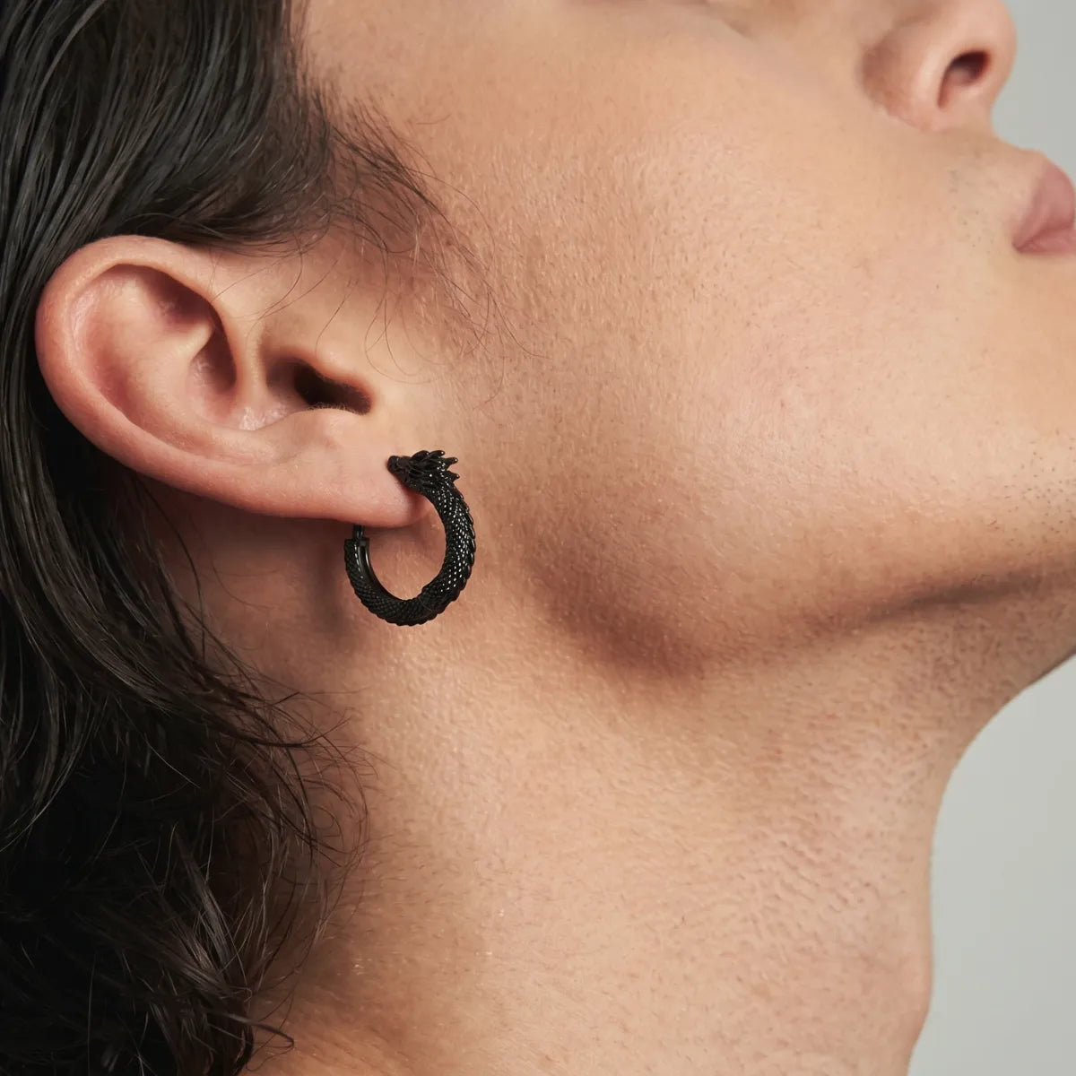 Dragon Hoop Earrings Black Worn by Male Model Close Up