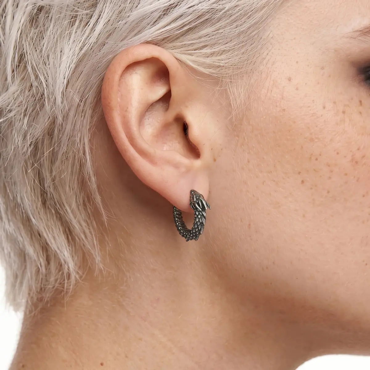 Dragon Huggie Earrings Silver Worn by Female Model