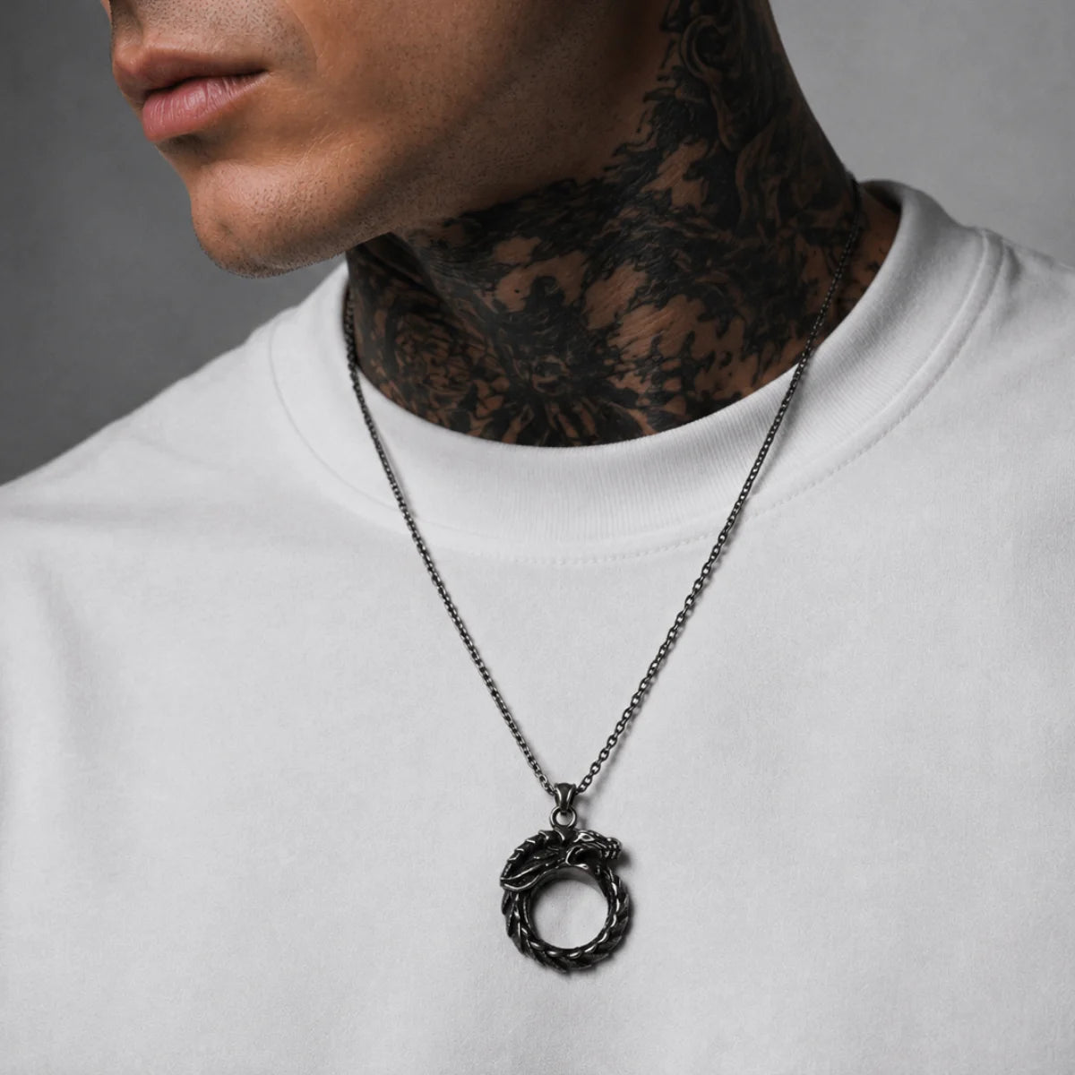Dragon Ouroboros Pendant Necklace Silver Worn by Male Model Chest View