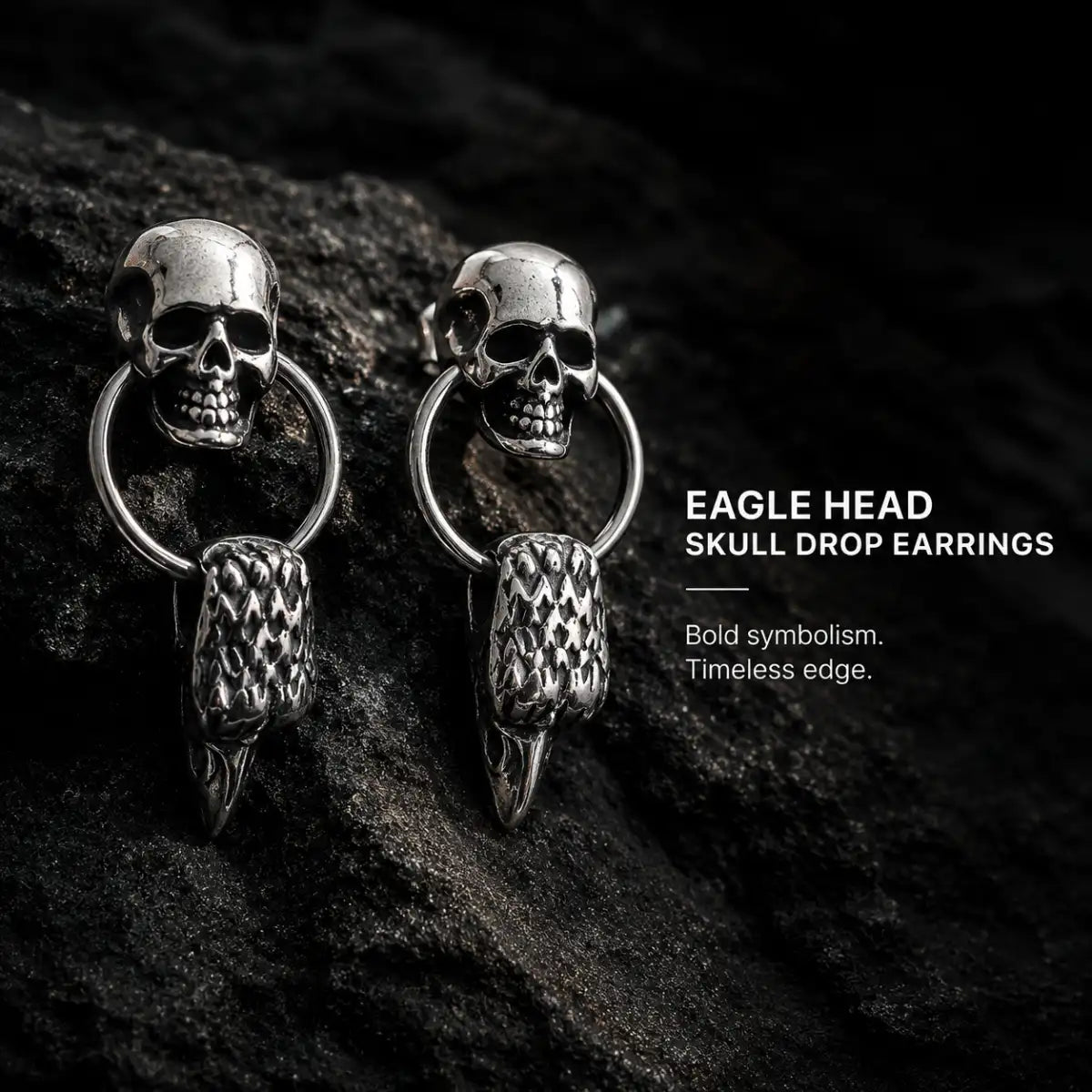 Eagle Head Skull Drop Earrings Silver Pair Displayed on Stone Surface