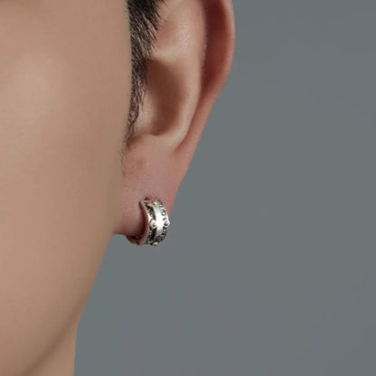 Embossed Cross Hoop Earrings Worn by Male Model Close Up