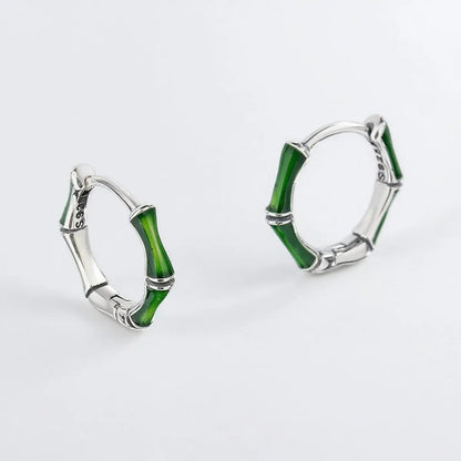Emerald bamboo silver hoop earrings front view