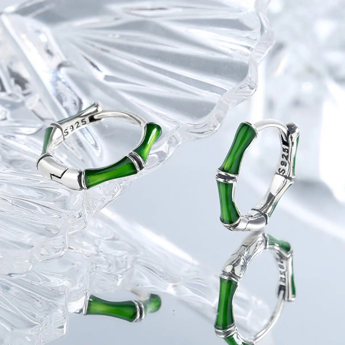 Emerald bamboo silver hoop earrings side view