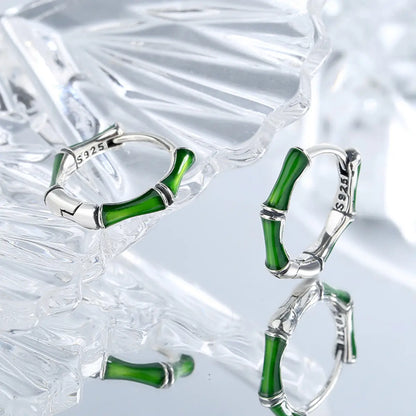 Emerald bamboo silver hoop earrings side view