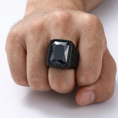 Engraved Black Gemstone Signet Ring Worn by Male Model Close Up