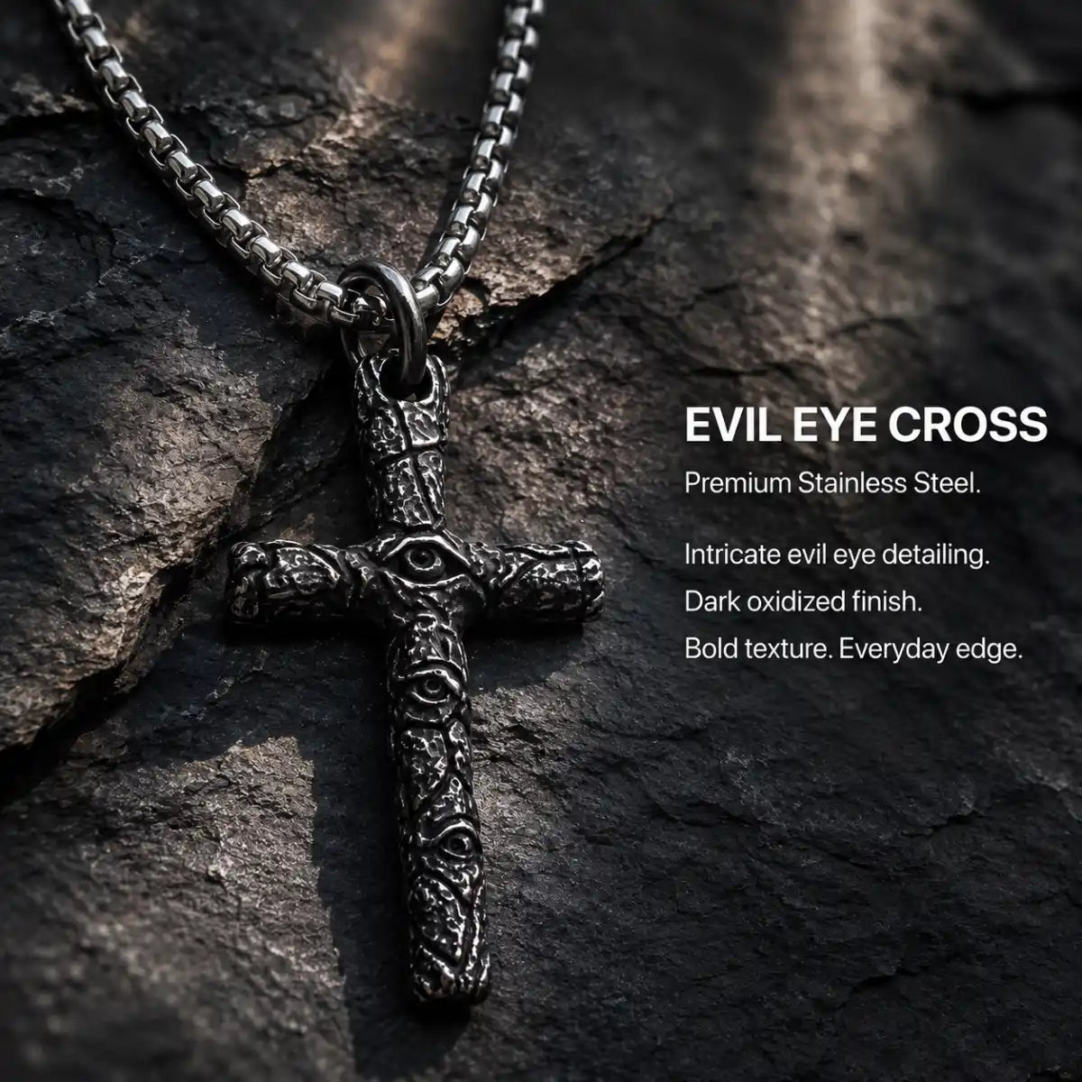 Evil Eye Cross Necklace Silver Displayed on Stone Surface
