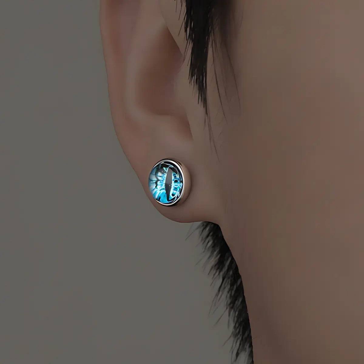 Evil Eye Stud Earrings Blue Worn by Male Model Front