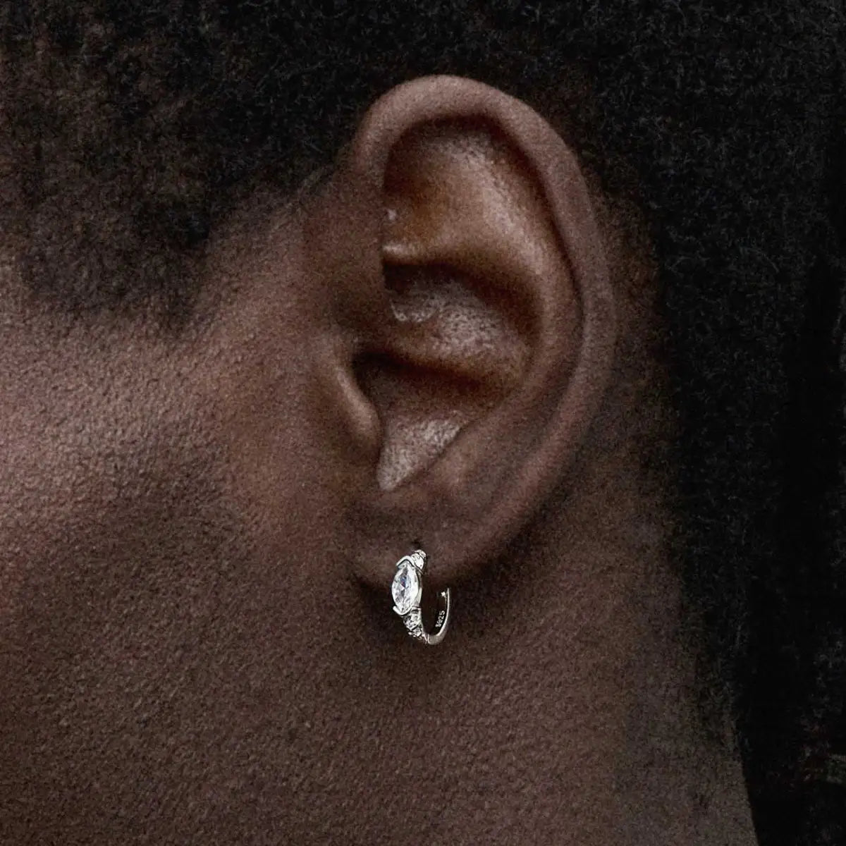 Eye of Horus Hoop Earrings White CZ Worn by Male Model