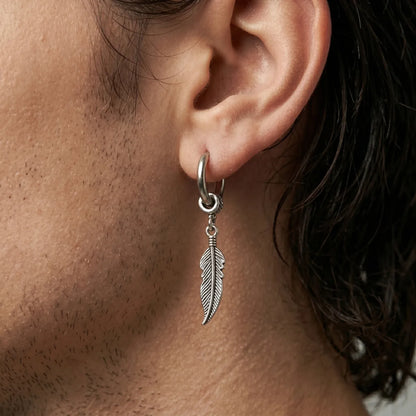 Feather Charm Earrings Silver Worn by Male Model Close Up