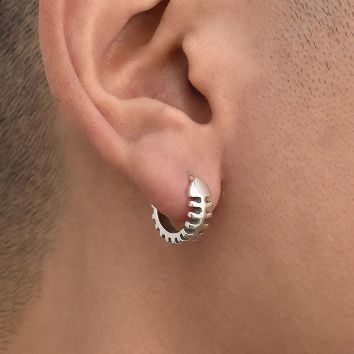Fish Skeleton Hoop Earrings Worn by Male Model