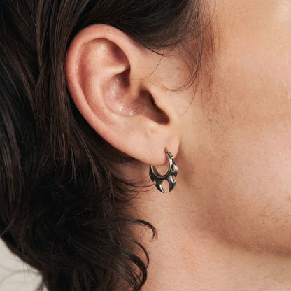 Flame Blade Earrings Silver Worn by Male Model Side View