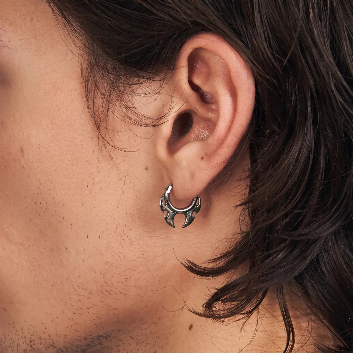 Flame Blade Earrings Silver Worn by Male Model