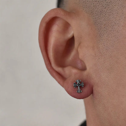 Fleur de Lis Cross Stud Earrings Worn by Male Model Close Up