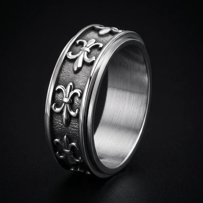 Fleur de Lis Spinner Ring Silver Close Up Black Background