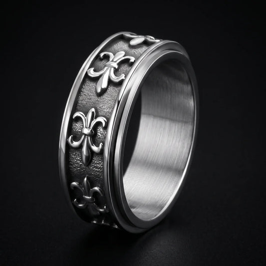 Fleur de Lis Spinner Ring Silver Close Up Black Background