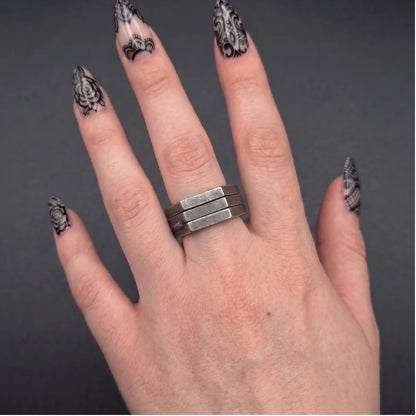 Folding Hex Ring Folded Worn on One Finger on Female Hand