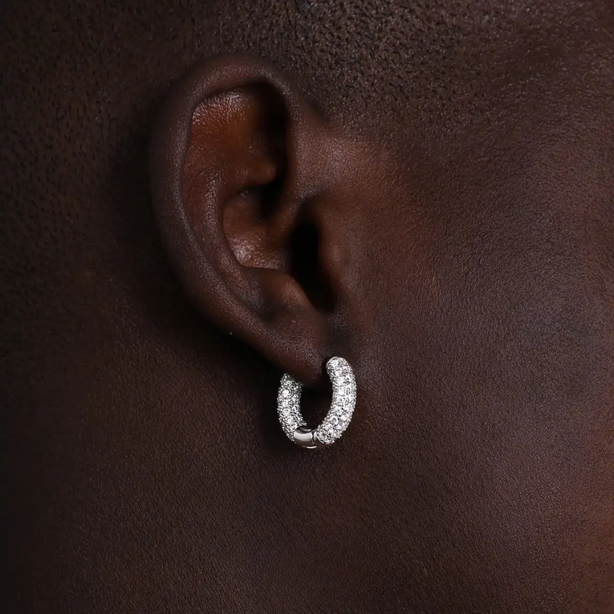 Full Pave Diamond Huggie Hoop Earrings White Gold Front Worn by Male Model