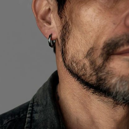 Geometric Silver Huggie Hoop Earrings Black Worn by Male Model Close Up
