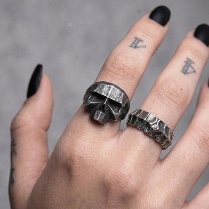 Geometric Skull Ring and Dragon Scale Ring Worn by Female Model