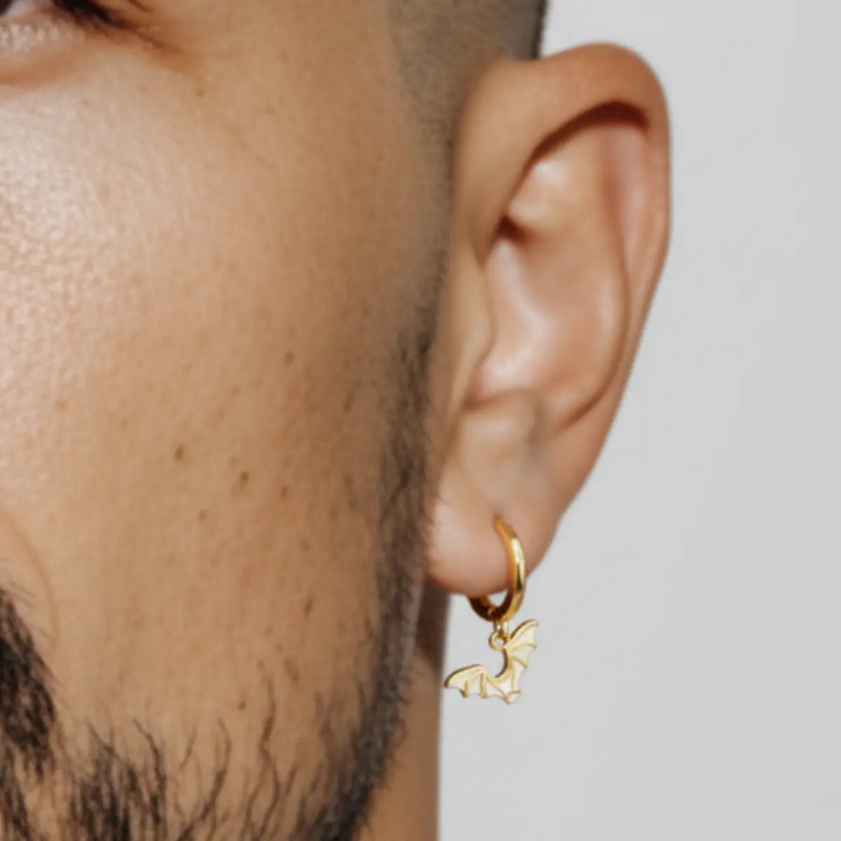 Gold Bat Wing Earrings Sterling Silver Worn by Male Model
