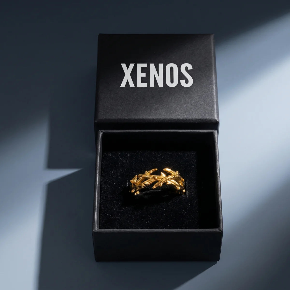 Gold Crown of Thorns Ring Inside a Xenos Jewelry Box