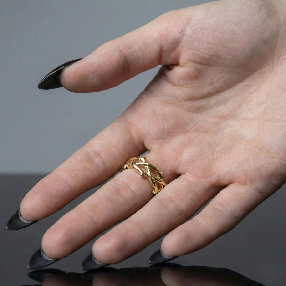 Gold Minimalist Thorns Ring Worn by Female Model Back View