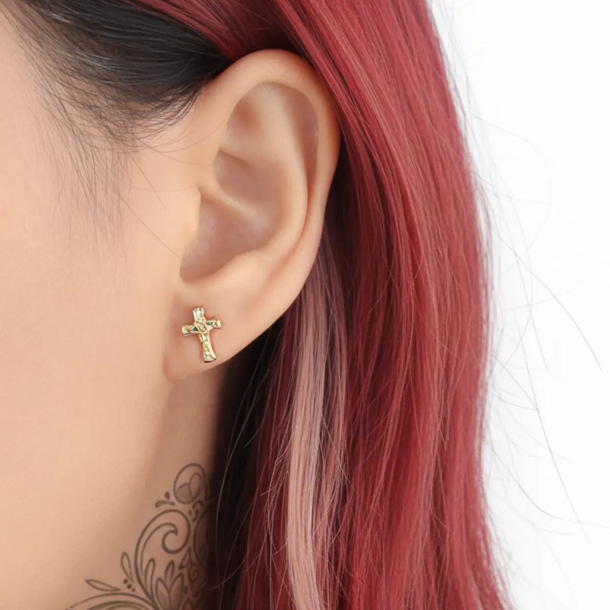 Gold Molten Pavé CZ Cross Stud Earrings Worn by Female Model