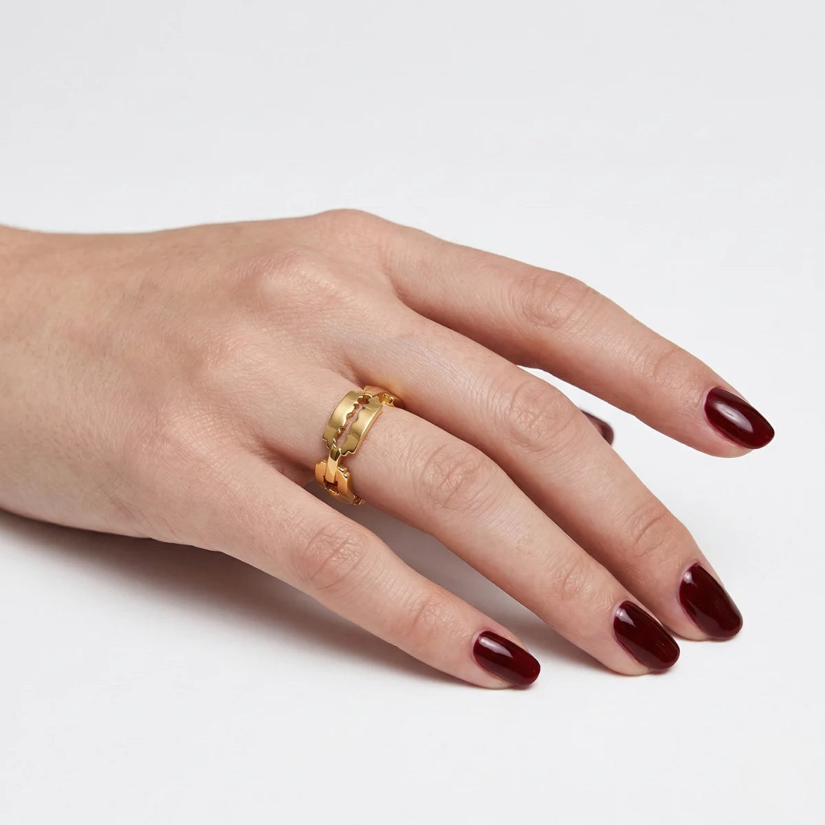 Gold Razor Blade Ring Worn by Female Model