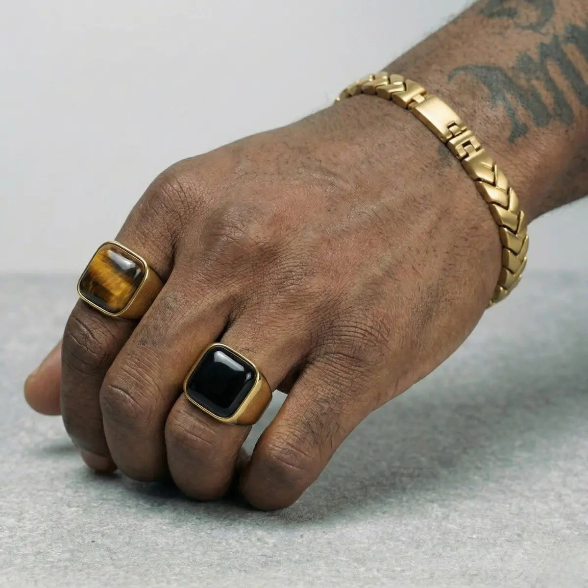 Gold Square Black Onyx Signet Ring and Gold Square Tiger Eye Signet Ring Worn by Male Model