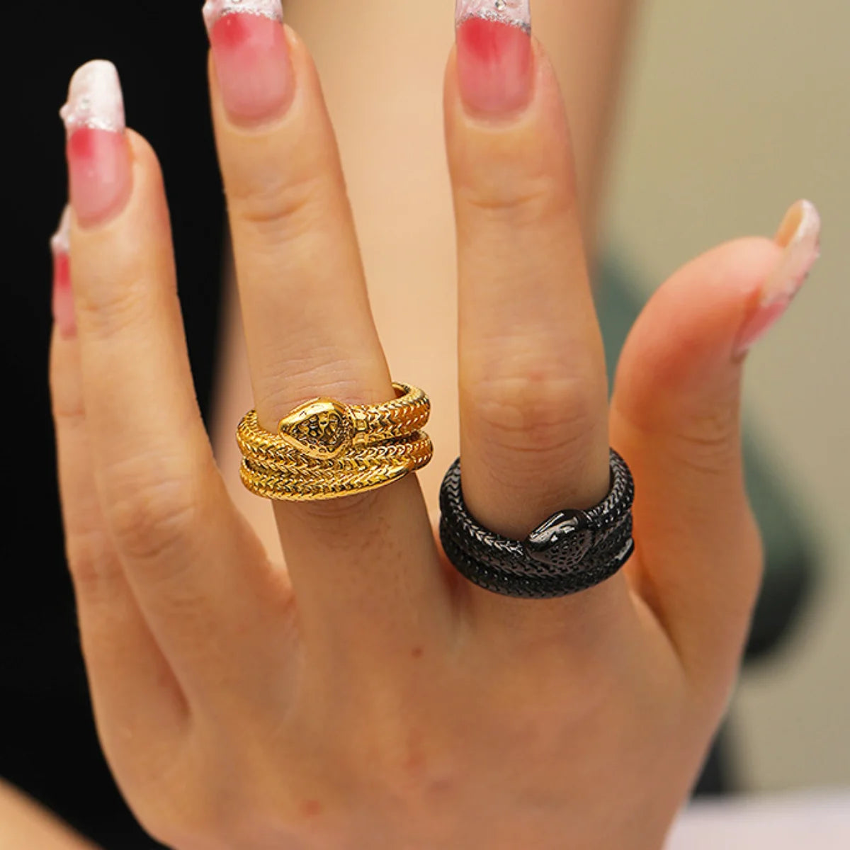 Gold and Black Double Wrap Snake Rings Worn by Female Model