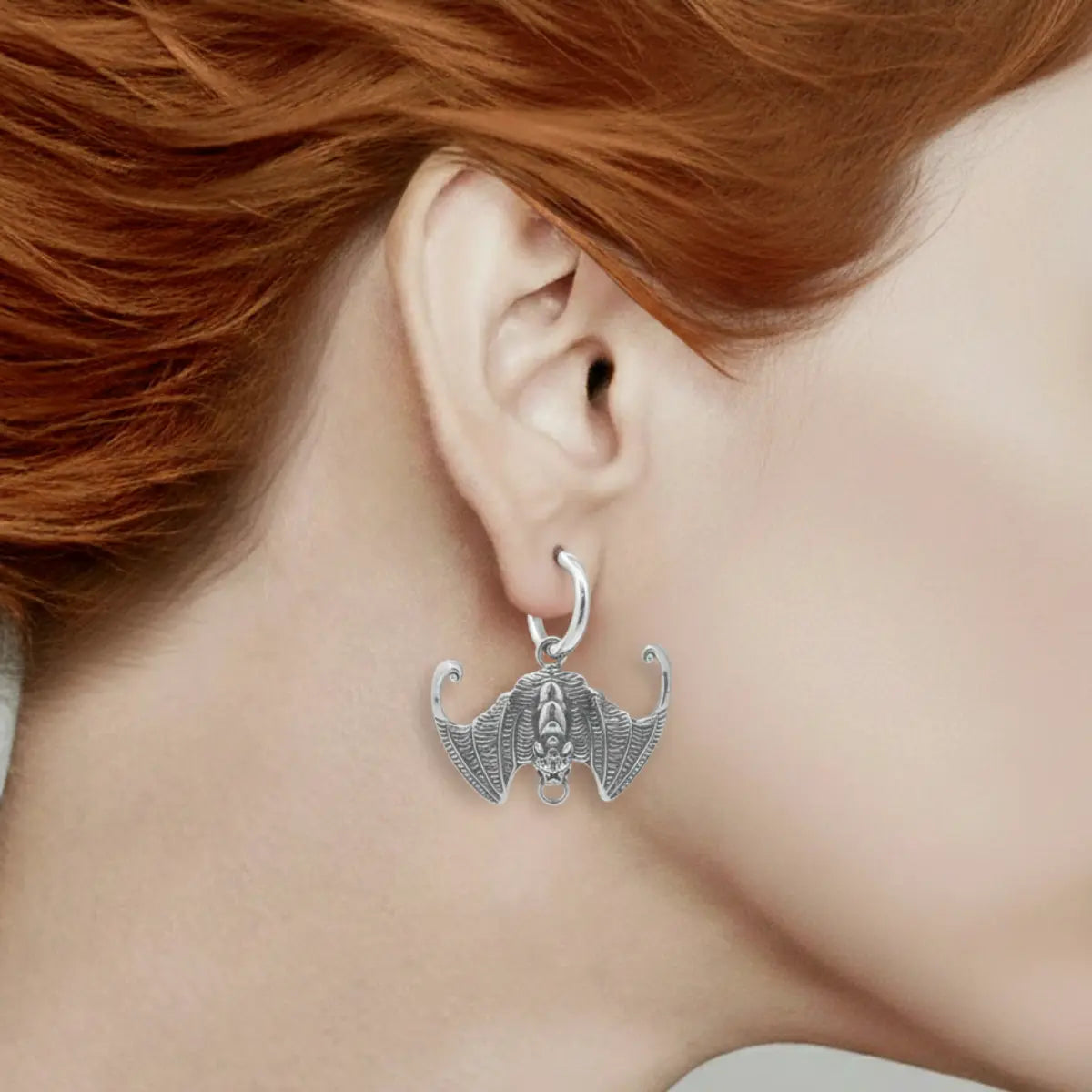 Gothic Bat Drop Hoop Earrings Worn by Female Model
