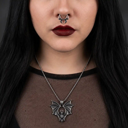 Gothic Bat Necklace Silver Worn by Female Model Chest View