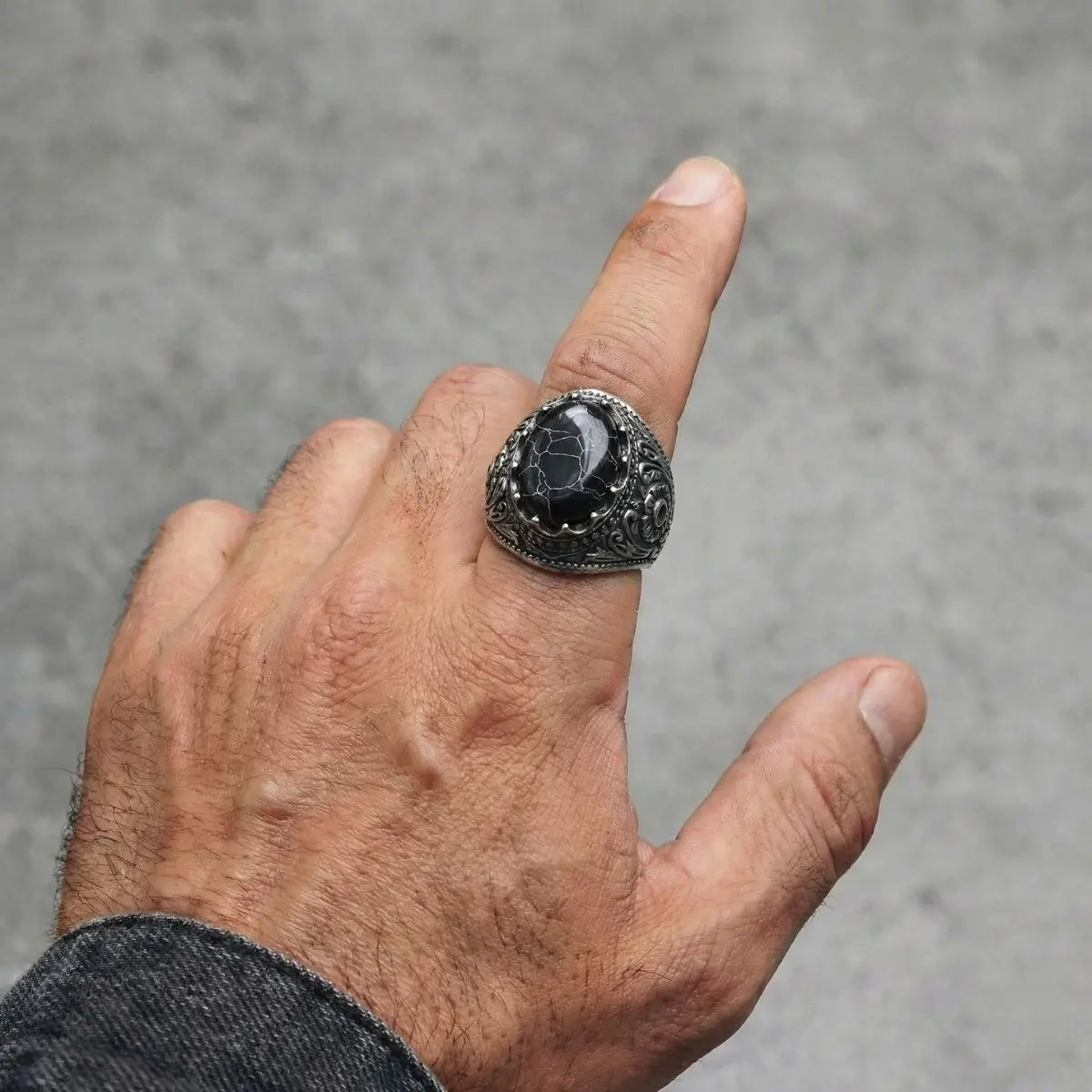 Gothic Black Turquoise Ring Worn by Male Model