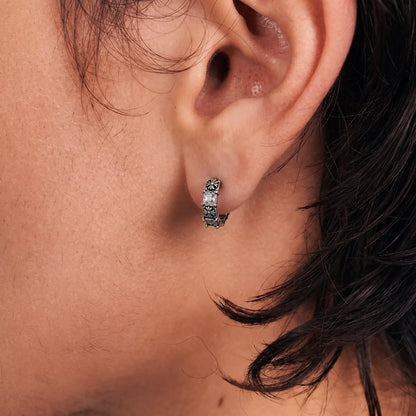 Gothic Cross CZ Huggie Hoop Earrings Silver Worn by Male Model Close Up