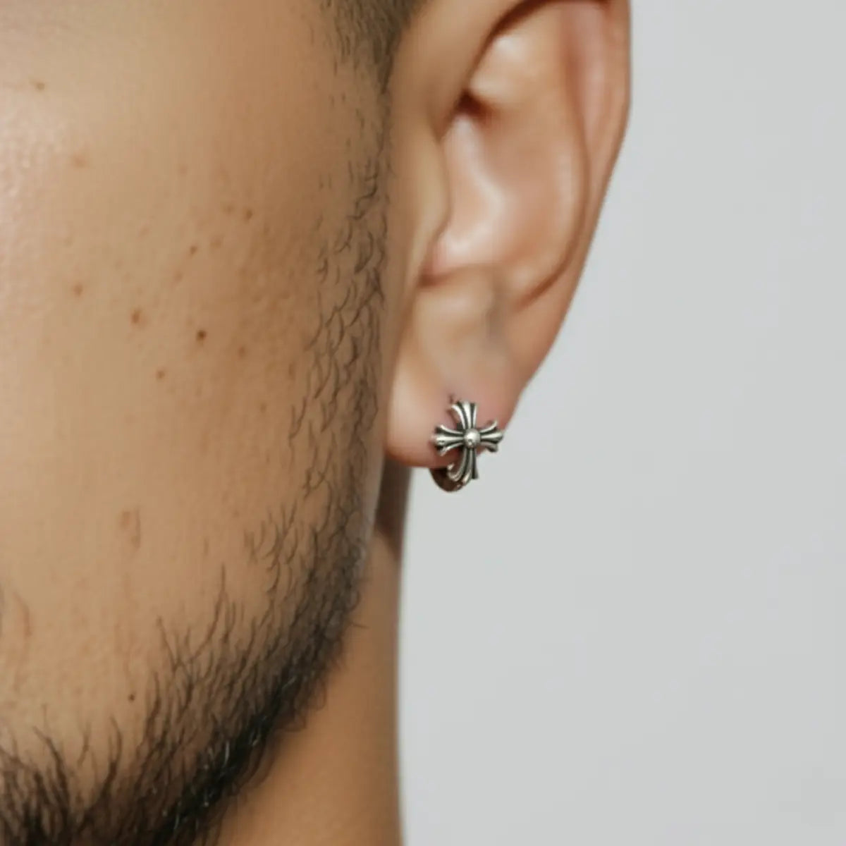 Gothic Cross Huggie Hoop Earrings Worn by Male Model